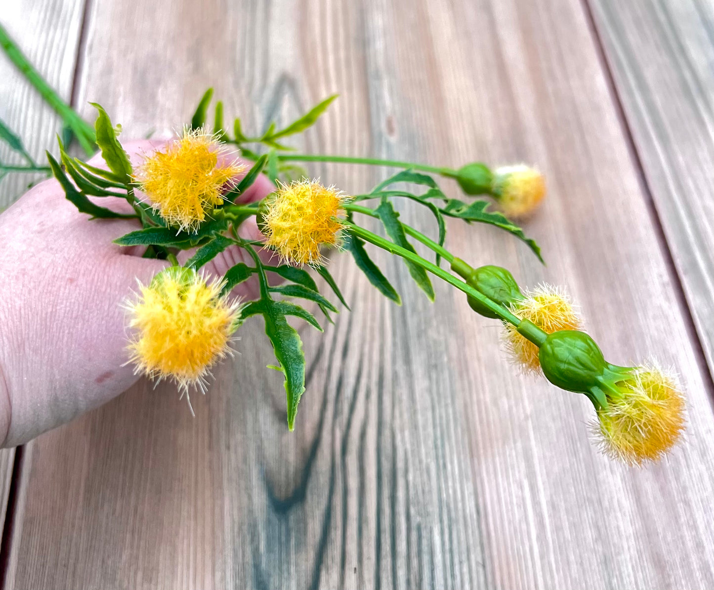 Designer's view of the Yellow Meadow Pod Spray illustrating natural movement and airy texture within floral designs