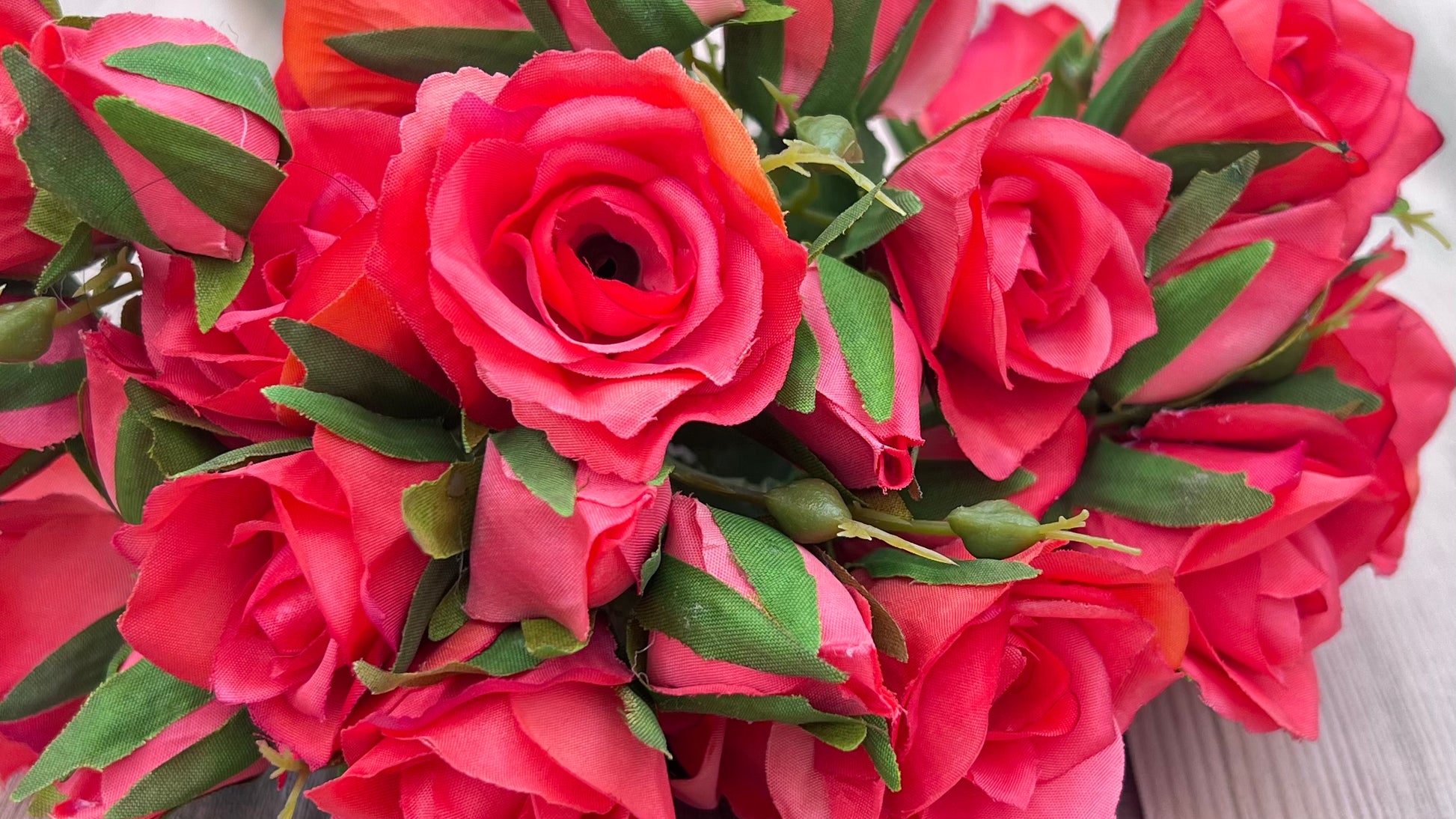 Sourced by Gardenbug Designs our Coral Rose Bundle showcasing clustered blooms and soft greenery accents