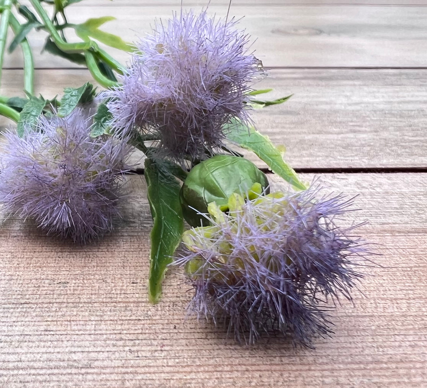 Faux Purple Meadow Pod Spray with soft lavender tufted pods sourced by Gardenbug Designs