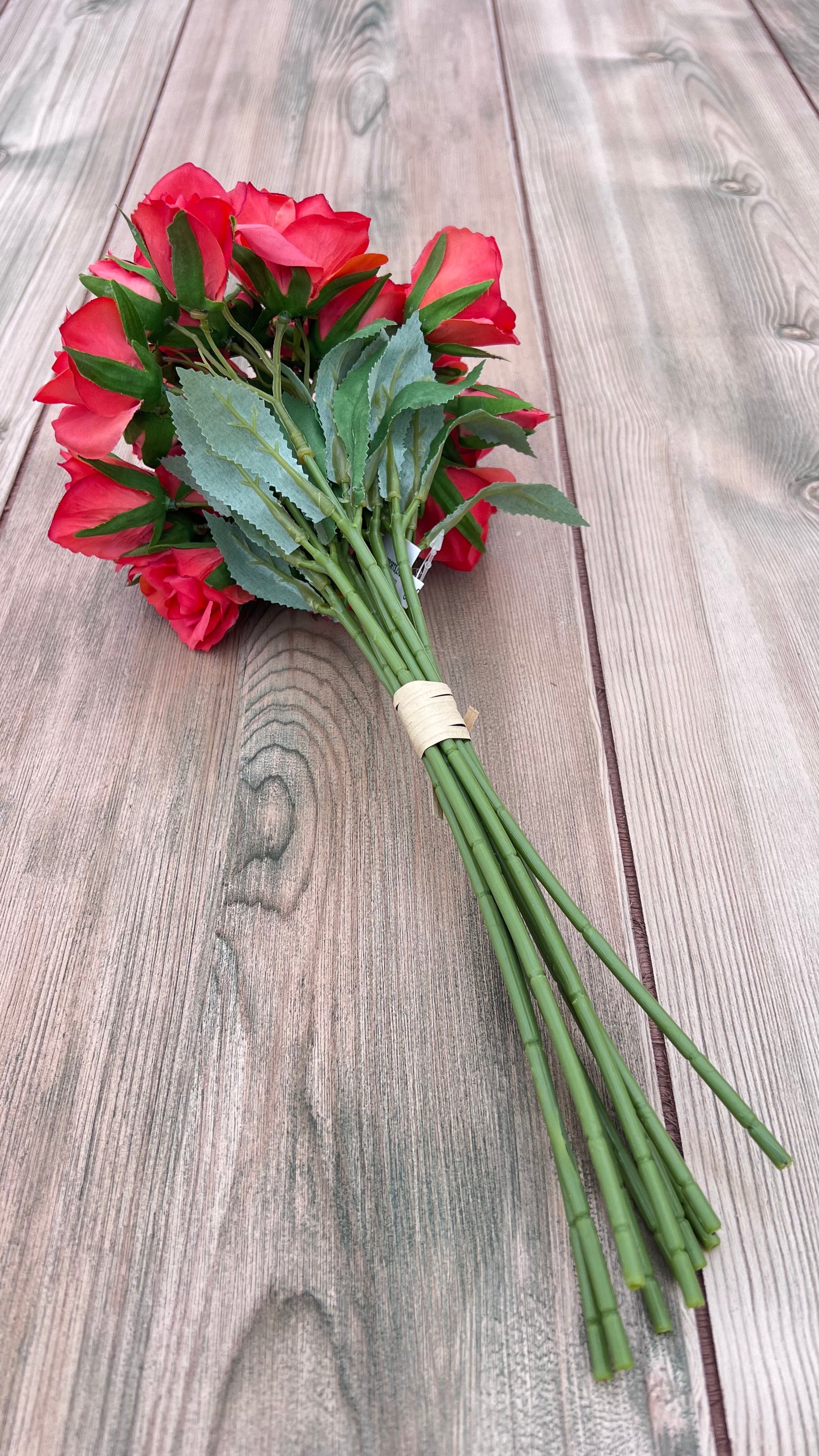 A Supporting Elements selection our Coral Rose Bundle featuring 10 rose stems and coordinating greenery bundled for convenience