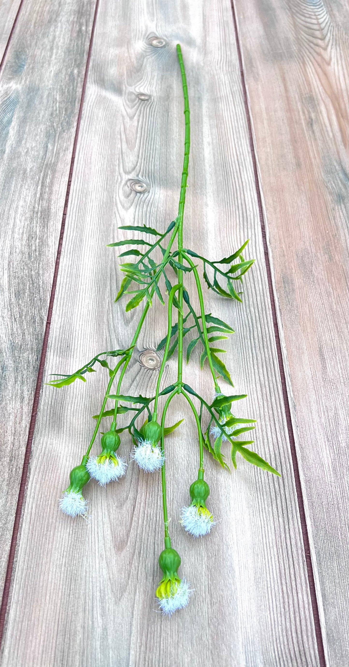 Full view of our Cream Meadow Pod Spray featuring six tufted pods on a branching floral spray
