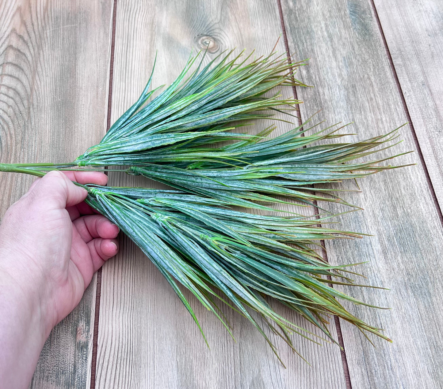 Fine Grass Bush | Yellow Green shown in hand for size reference and scale