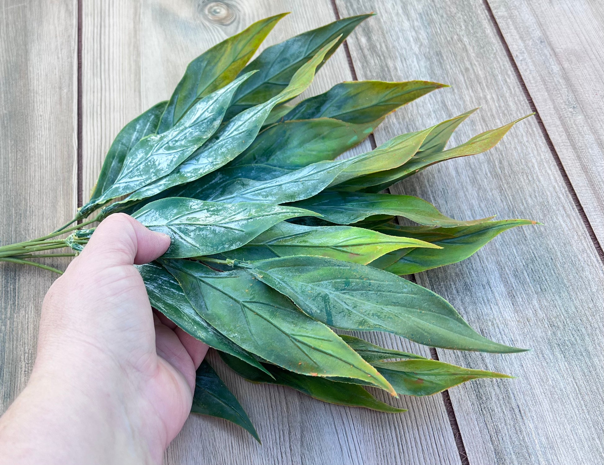 Leaf Bush — Yellow Green shown in hand for size reference and scale