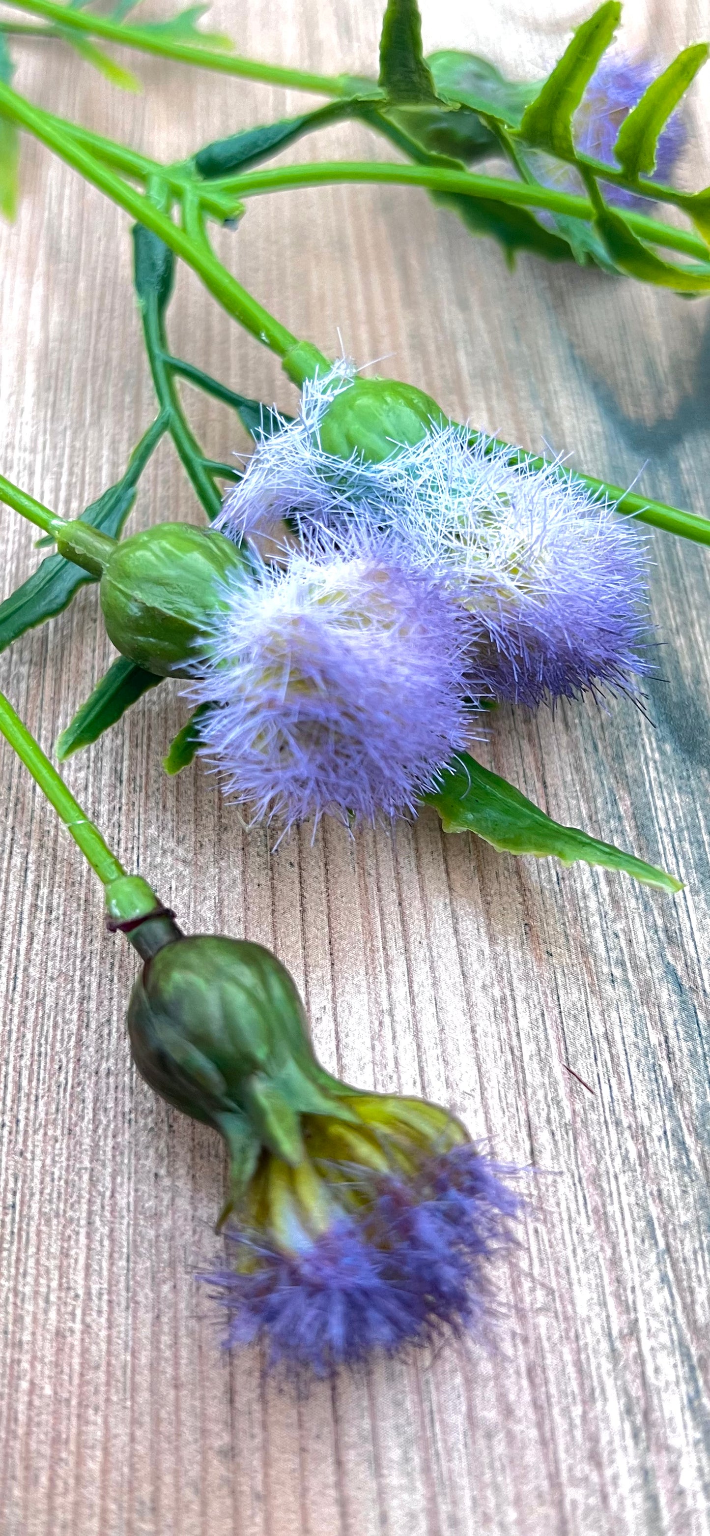 Close up detail of lavender meadow pods on the Purple Meadow Pod Spray