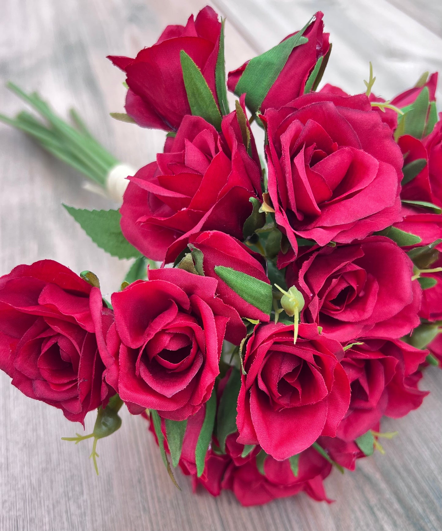 Red Rose Bundle highlighting layered petal texture and realistic floral construction