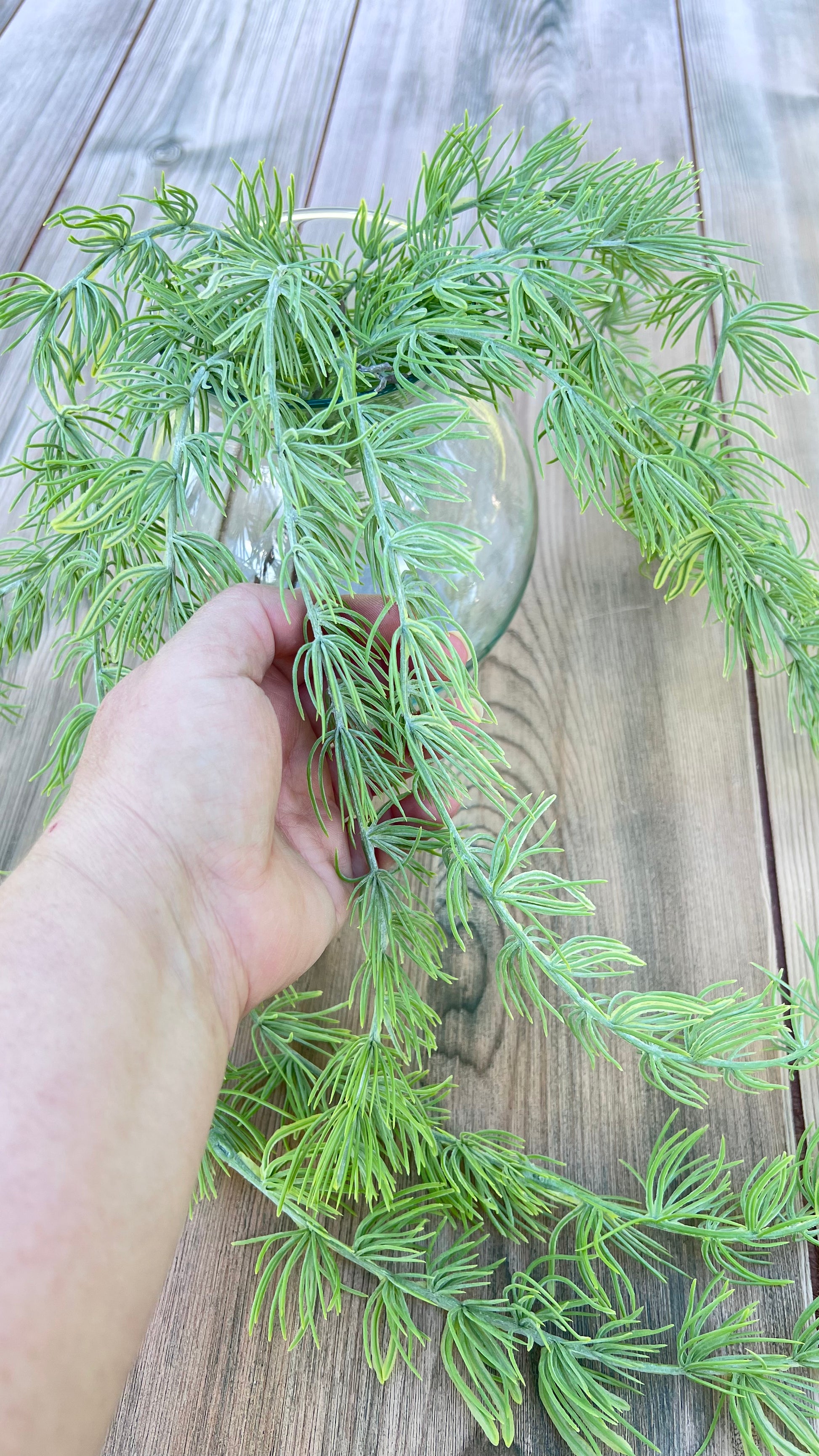 Hanging Cluster Vine shown in hand for scale and size reference
