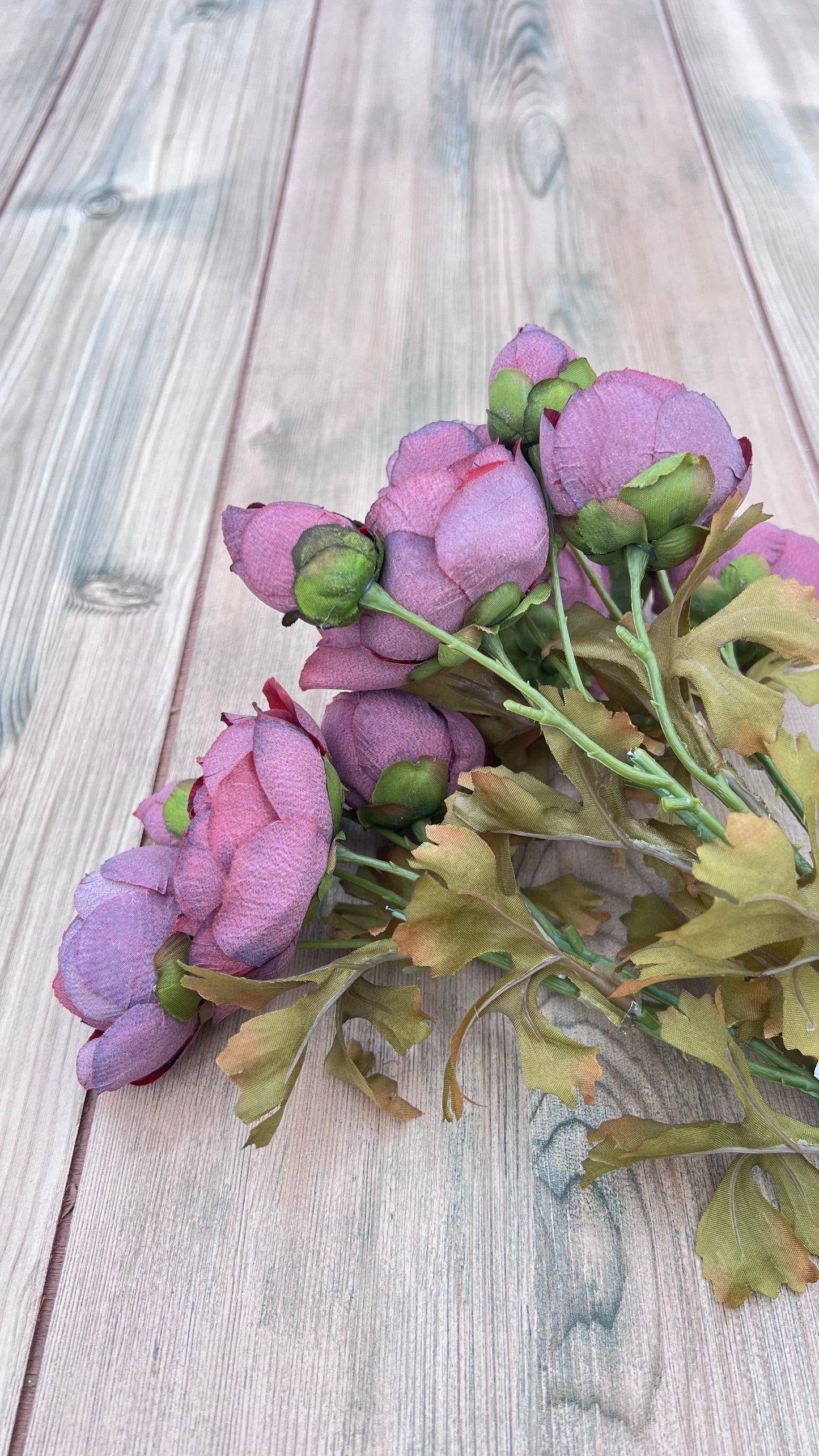 Rear view of the artificial Ranunculus Bundle in Burgundy highlighting branching stems, foliage structure, and realistic bud development.