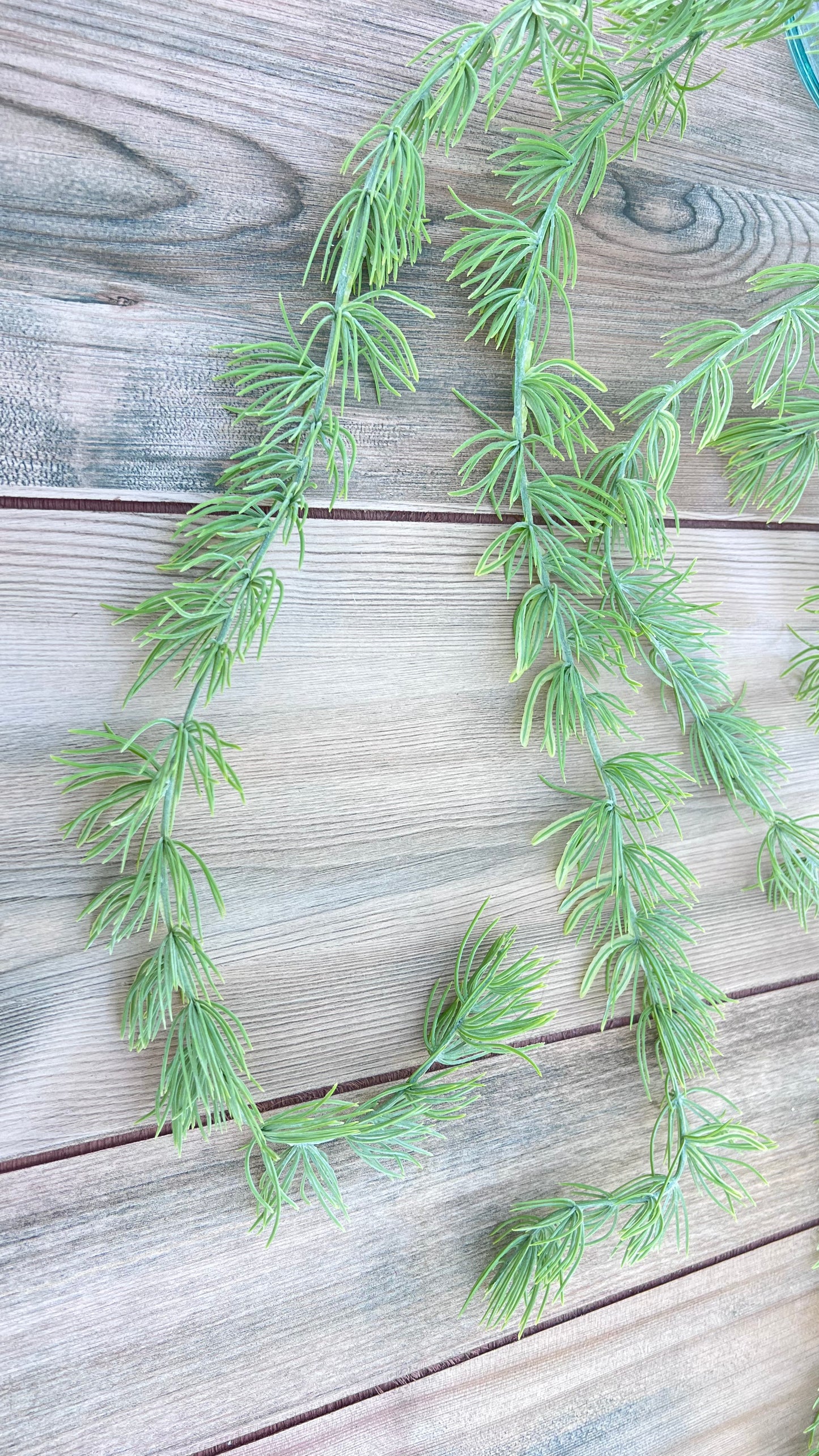 Single stem (vine) detail of our Hanging Cluster Vine showing soft sage foliage, trailing form, and vine construction