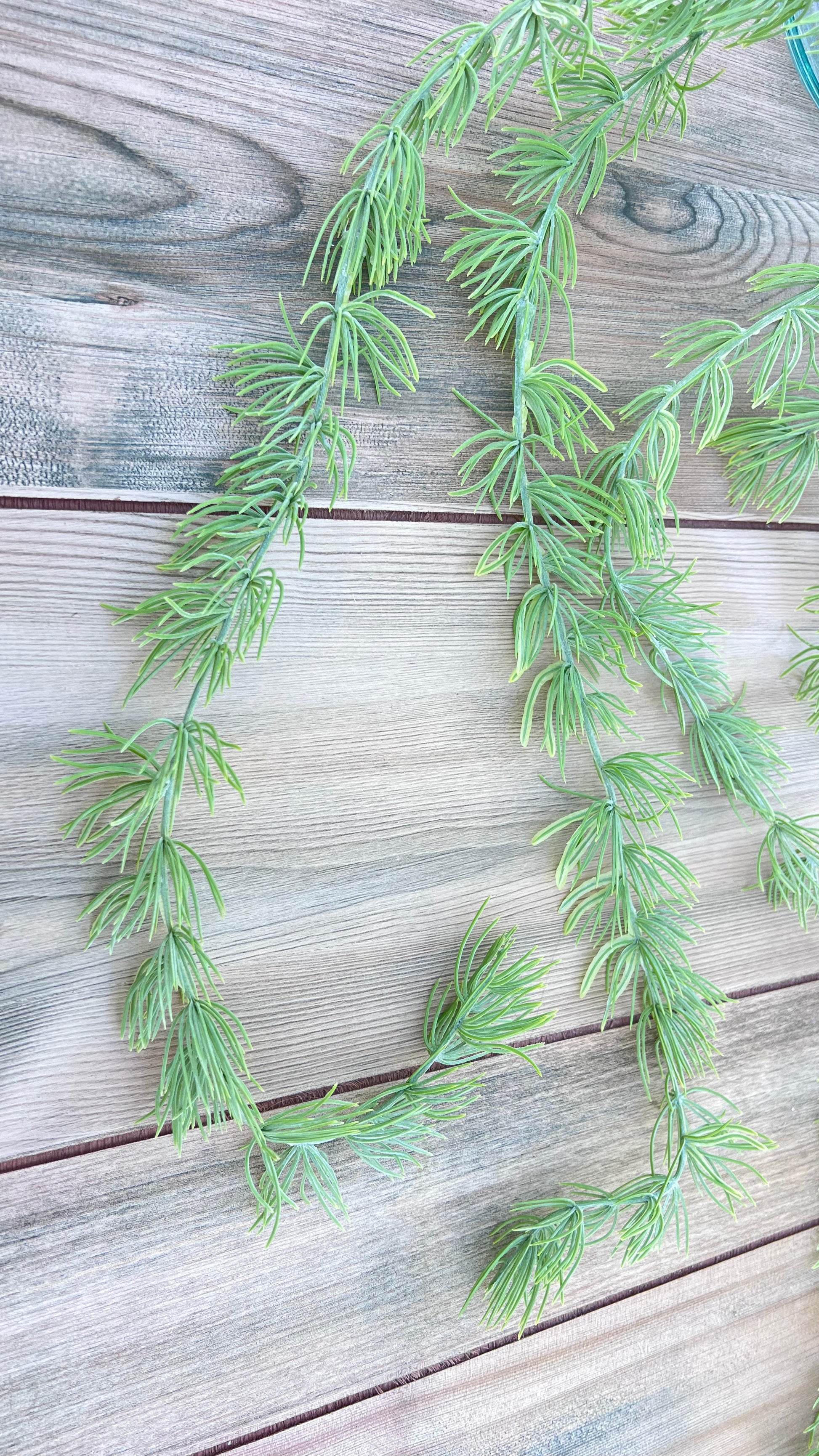 Single stem (vine) detail of our Hanging Cluster Vine showing soft sage foliage, trailing form, and vine construction