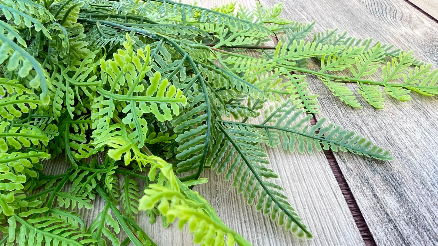 Close up detail of our Leather Leaf Fern bundle showing layered foliage and realistic surface texture