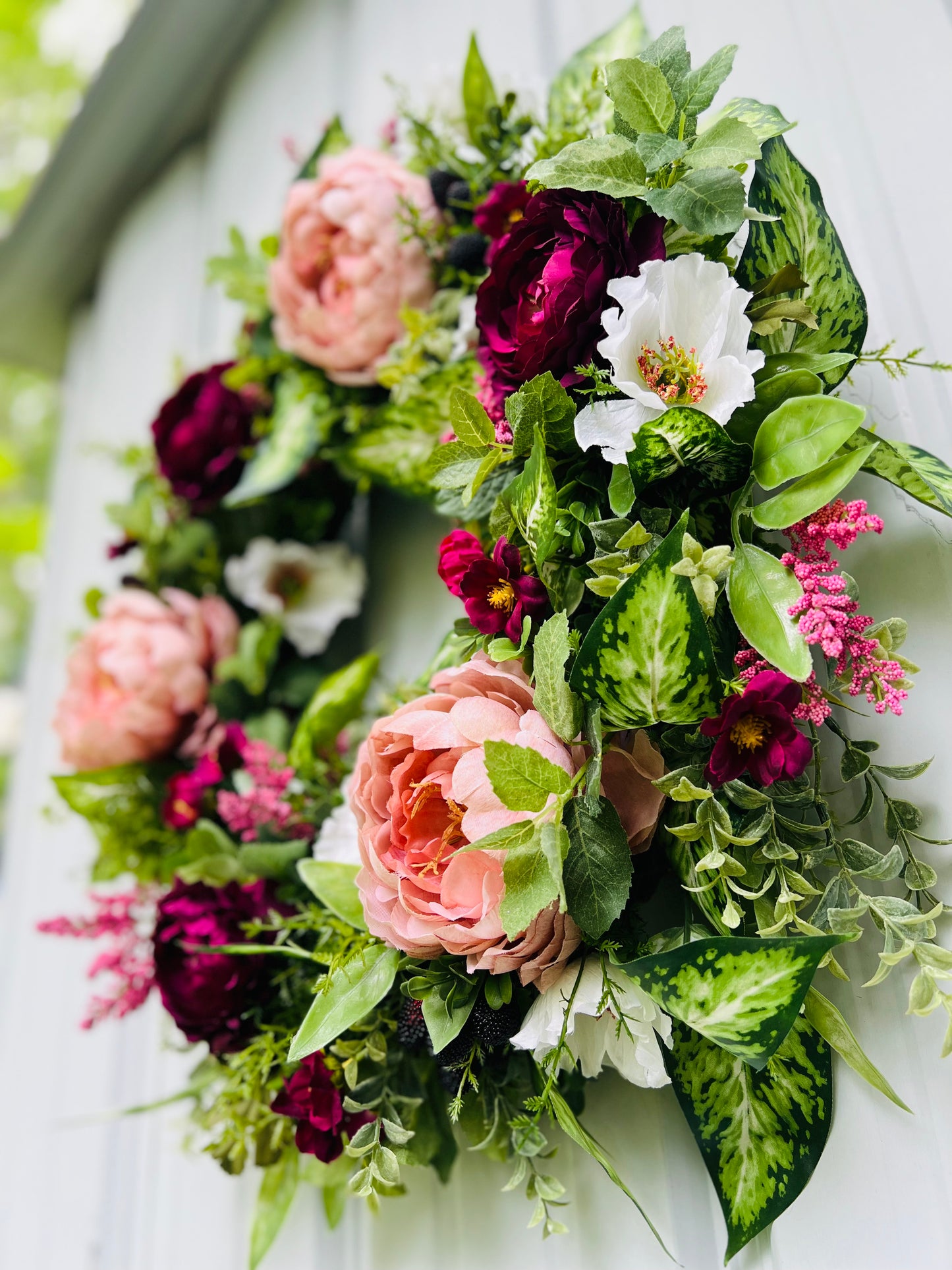 Blackberry Bourbon floral wreath design showing dimensional construction and layered greenery composition | Gardenbug Designs