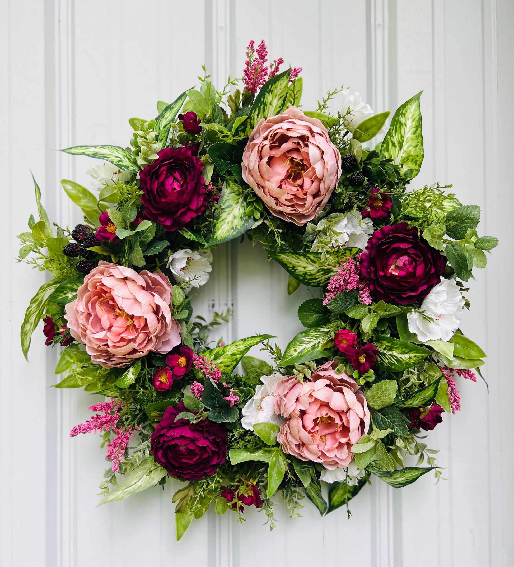 Blackberry Bourbon floral wreath design showcasing dimensional floral placement and natural botanical movement | Gardenbug Designs