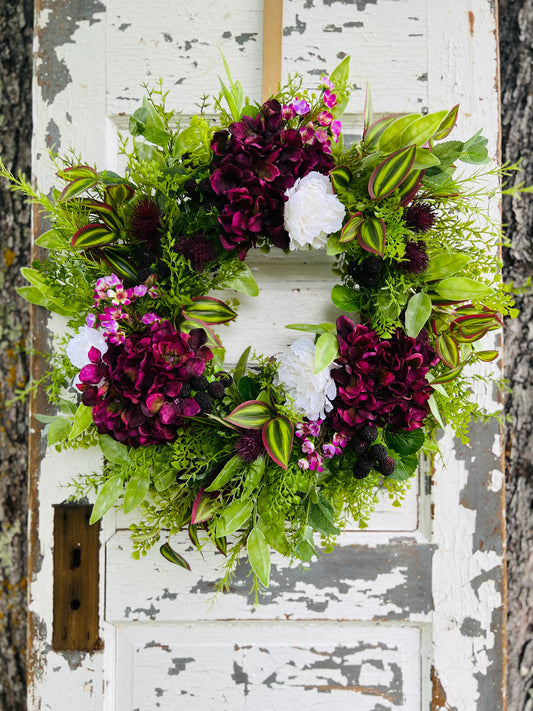 Handcrafted Blackberry Mint Botanical wreath with hydrangeas, peonies, blackberries, and greenery for spring and summer front door decor by Gardenbug Designs.